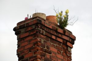 leaning or tilting chimney